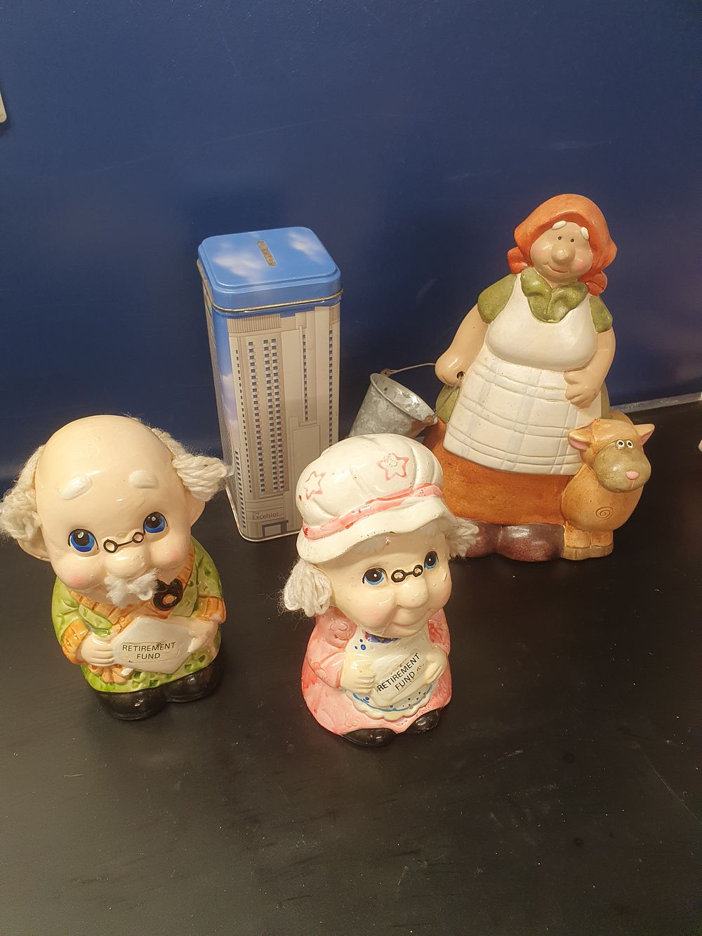 Lot 177: An Assortment of Vintage Ceramic Figural Money Boxes and a Lithographed Souvenir Tin