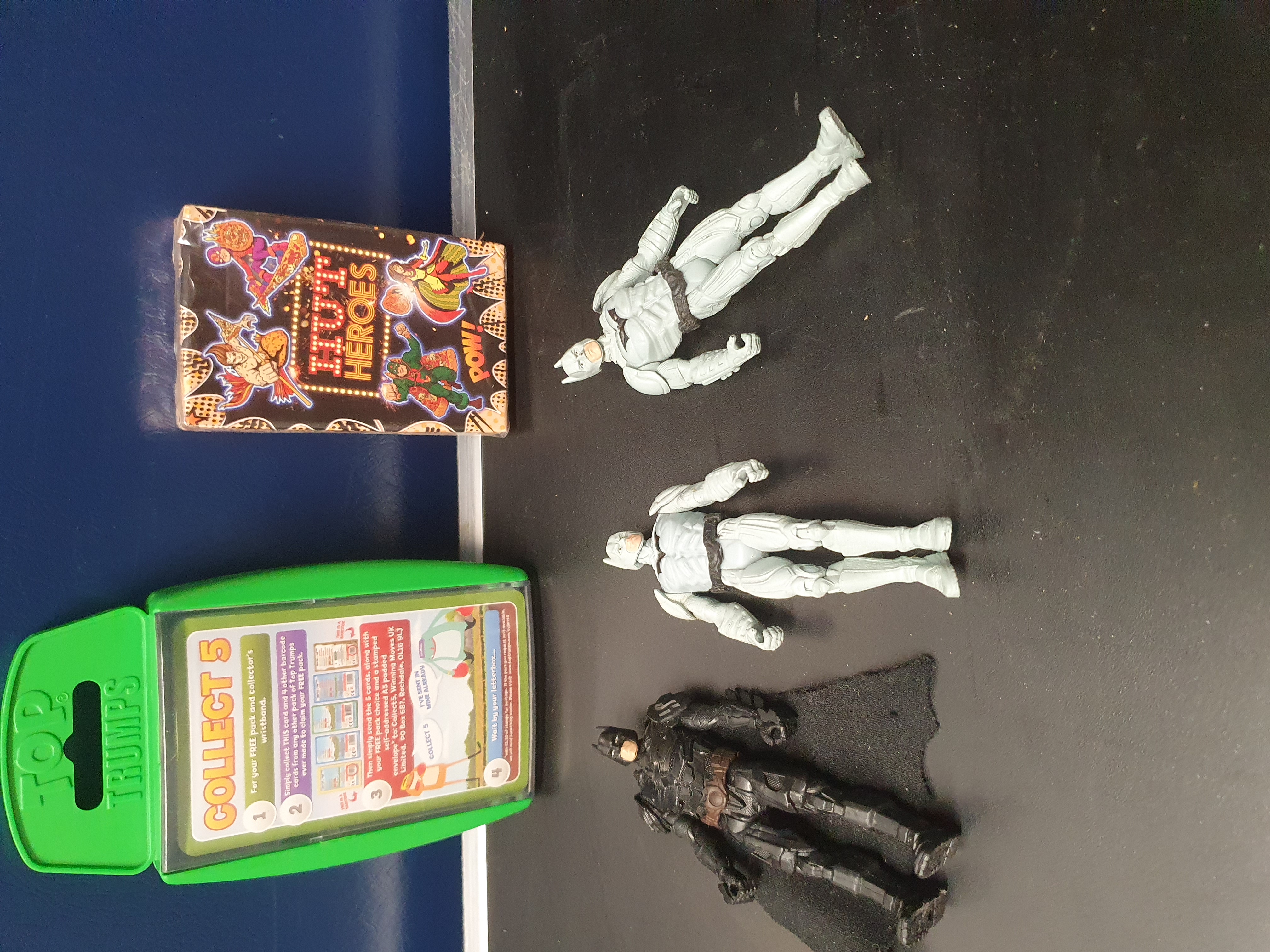 A Collection of Batman Action Figures and Character Card Games, Ninja Turtles Top Trumps