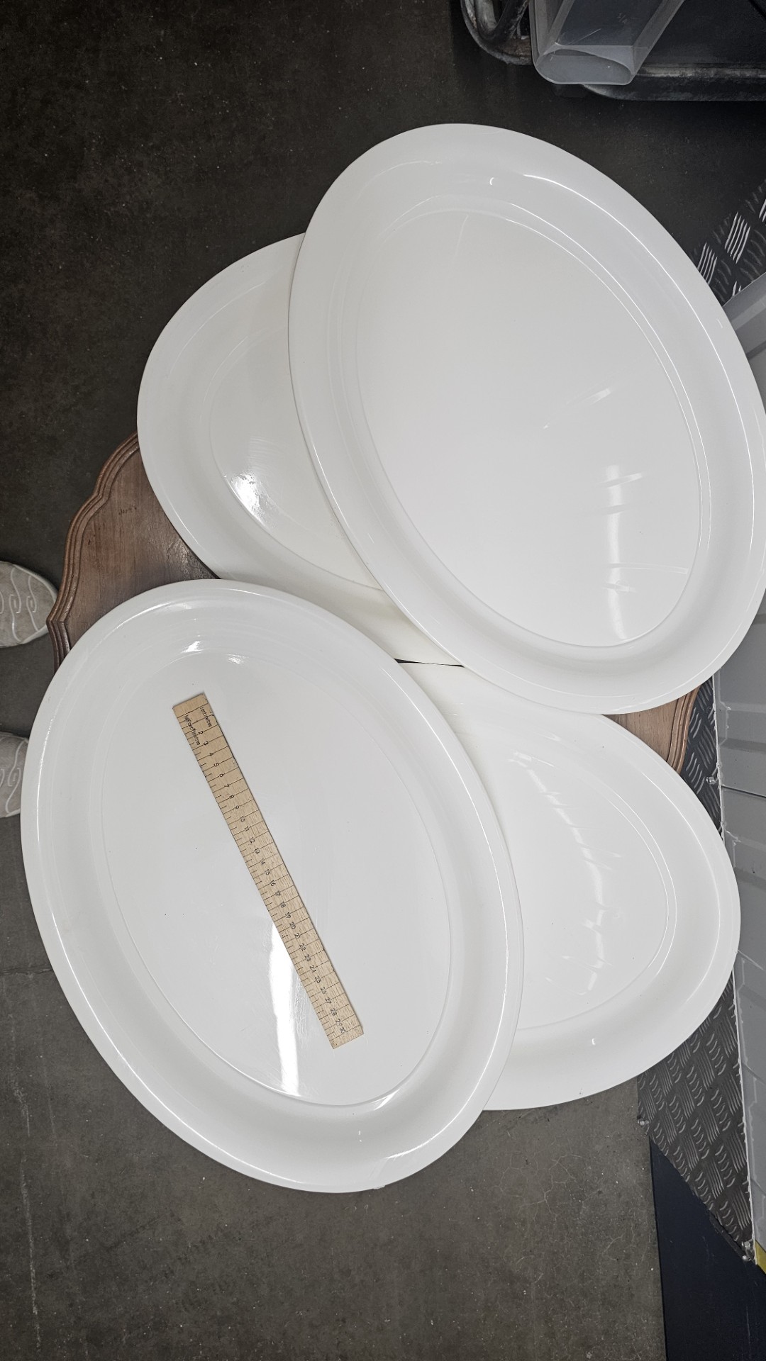 A Set of 4 Large White Glazed Plastic Oval Serving Platters