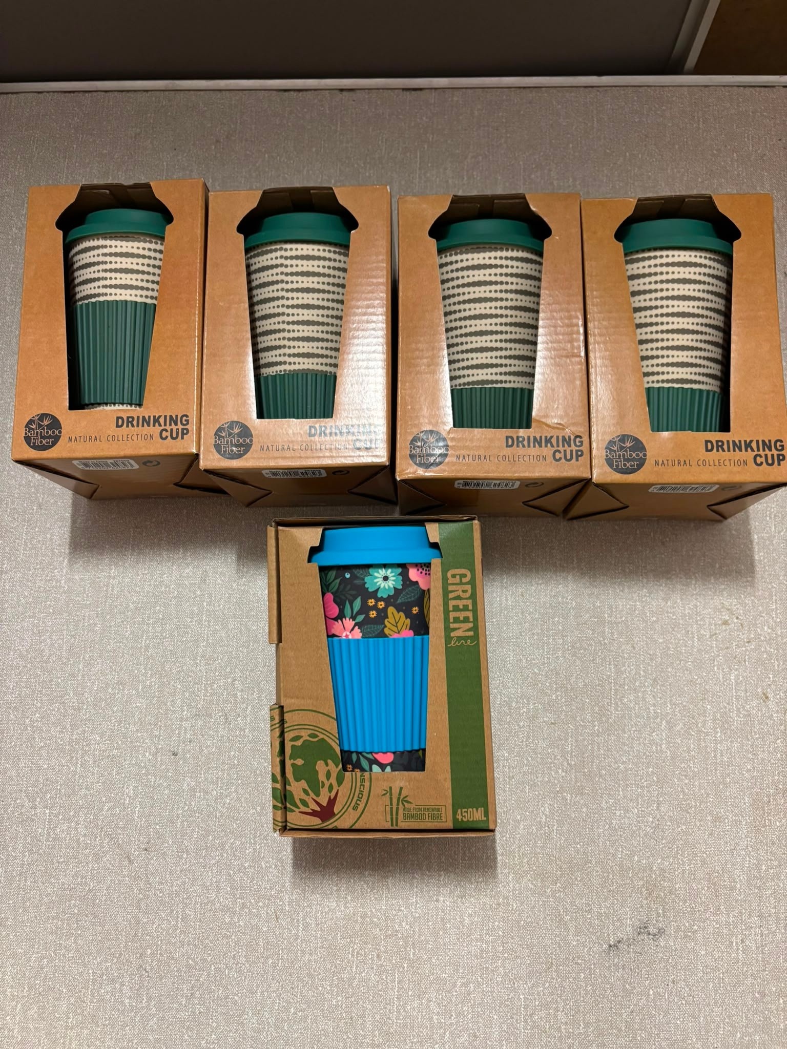 A Collection of Reusable Bamboo Fibre Drinking Cups in Original Packaging