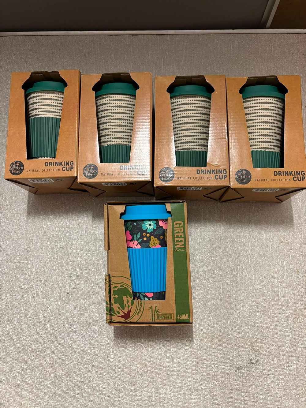Lot 206: A Collection of Reusable Bamboo Fibre Drinking Cups in Original Packaging
