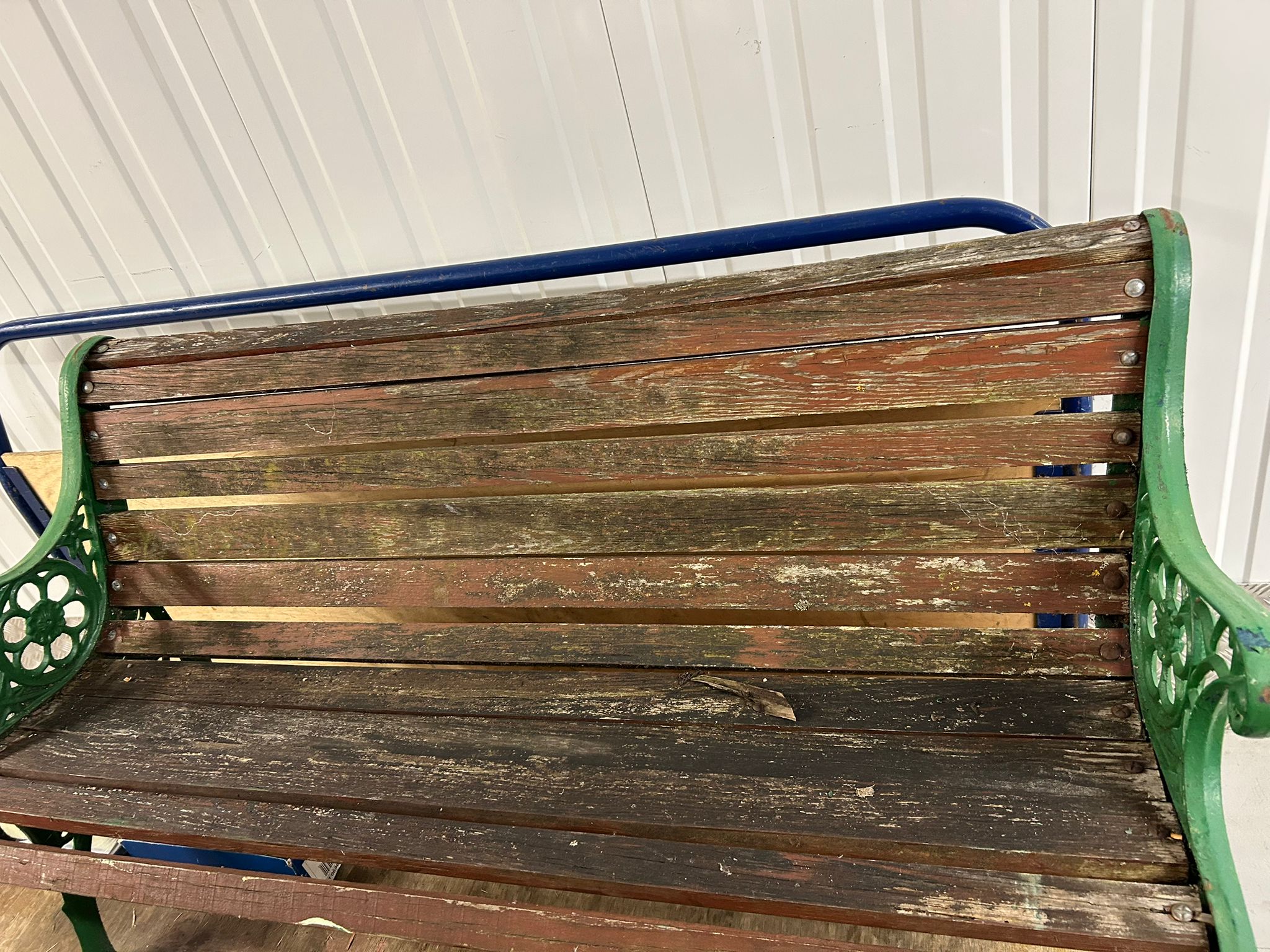 A Victorian Style Cast Iron and Wood Garden Bench
