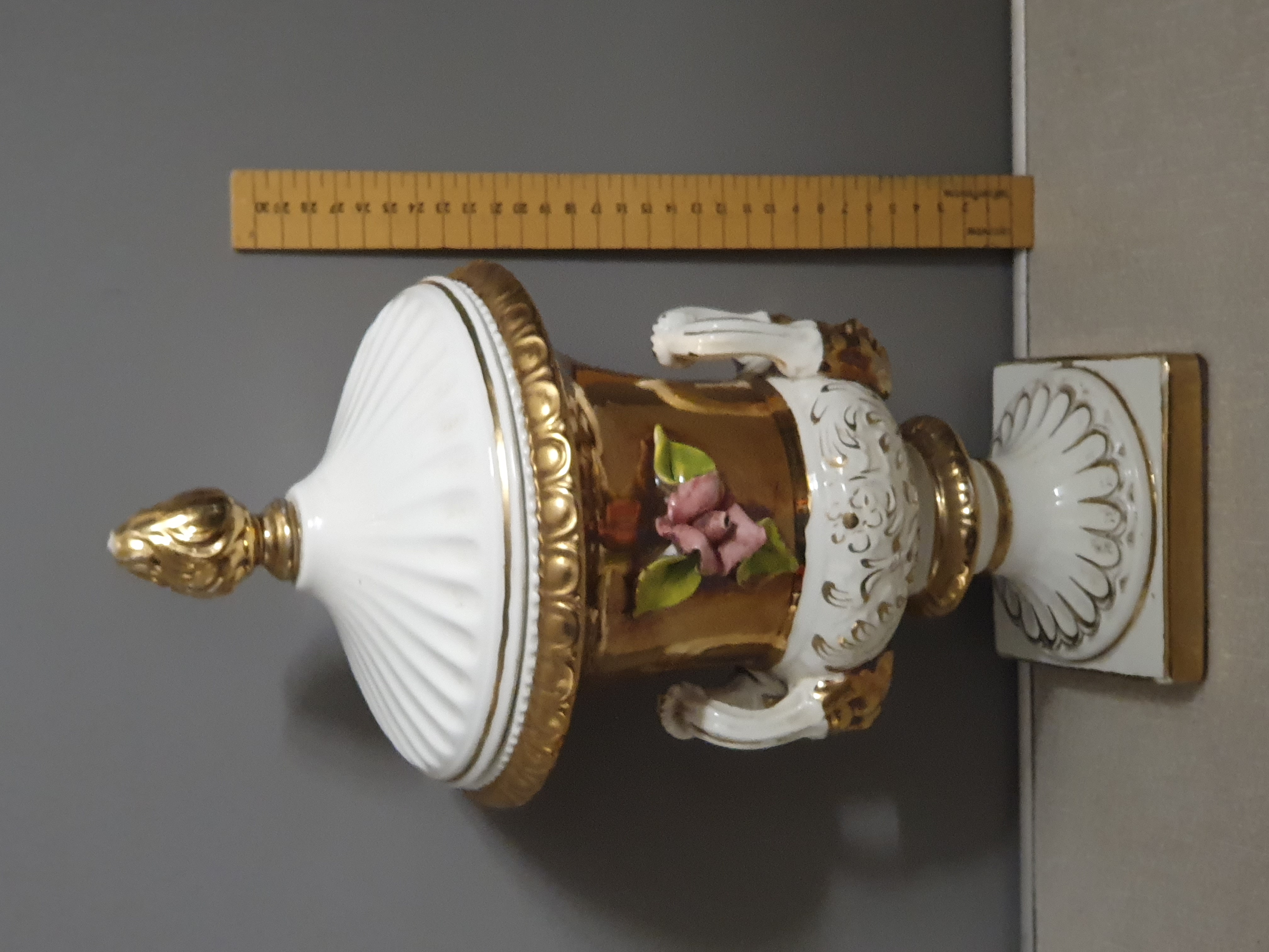 A Decorative Lidded Porcelain Urn with Gold Lustre and Encrusted Rose Decoration