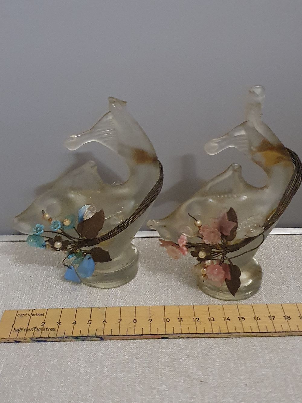 Lot 220: A Pair of Mid-20th-Century Frosted Glass Aquatic Style Figurines with Floral Beadwork