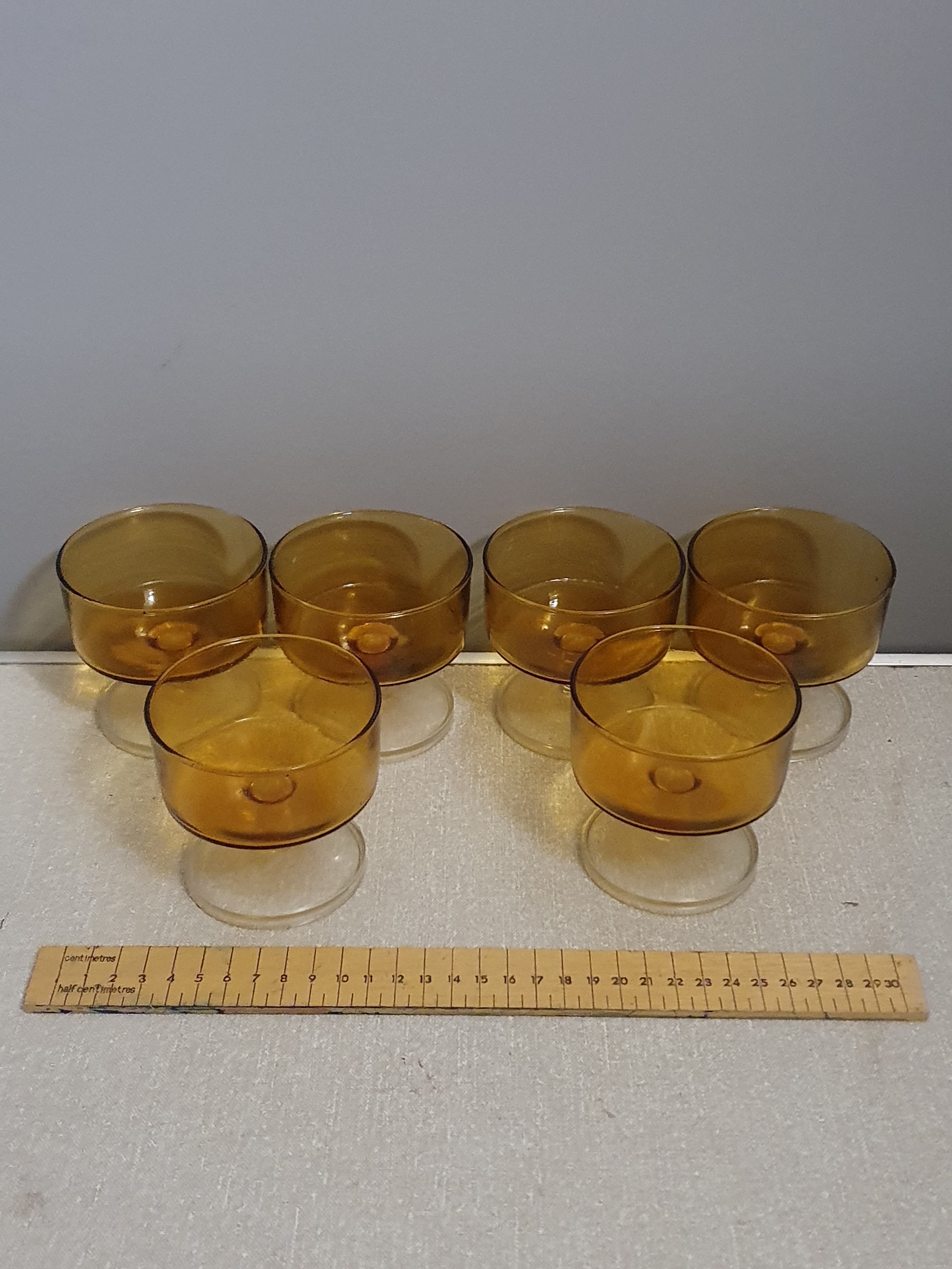 A Set of Six Mid-Century French Amber Glass Stemmed Glasses