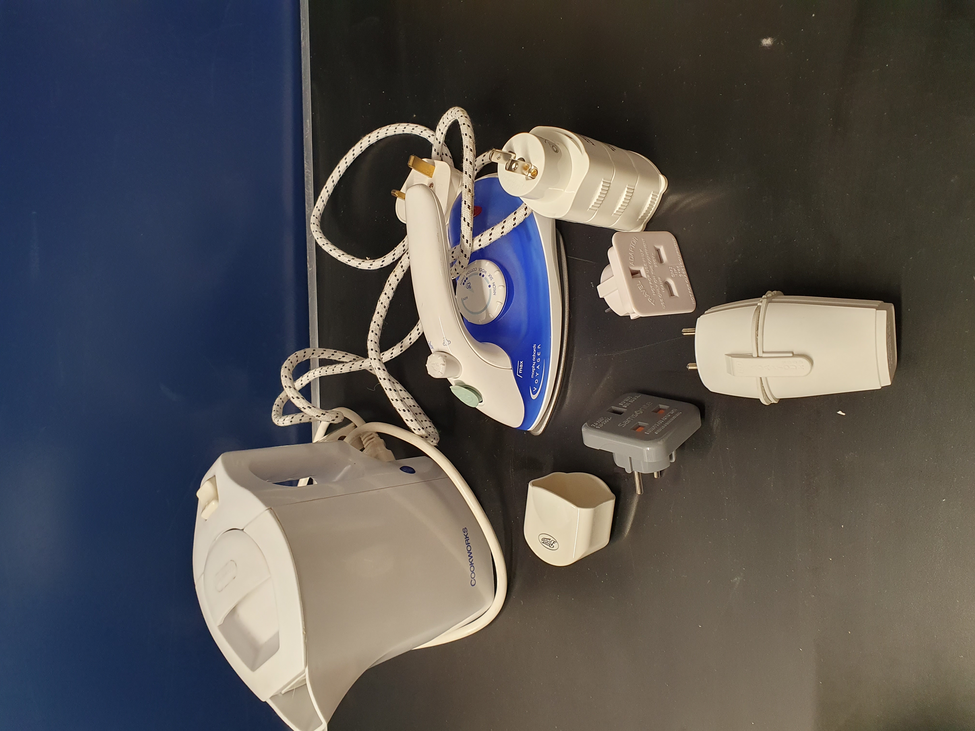 A Collection of Small Travel Appliances including a Morphy Richards Voyager Steam Travel Iron and Cookworks Kettle