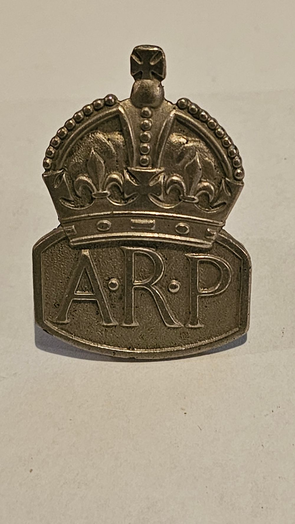 Lot 241: A 1938 Silver British Air Raid Precautions (ARP) Lapel Badge by Marples & Beasley