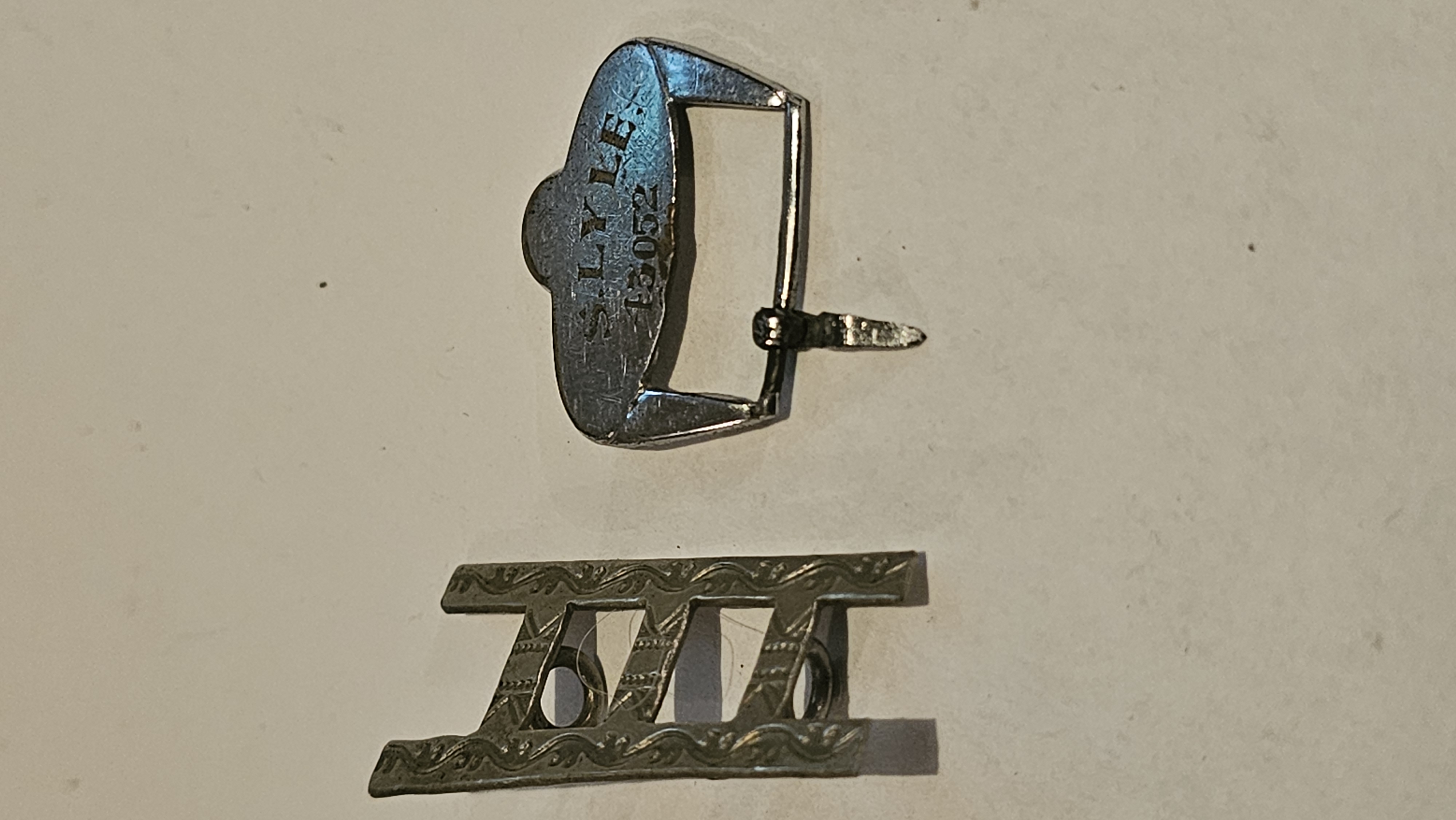 Two Items of British Military Badges and Personal Equipment Including a Buckle for S. Lyle