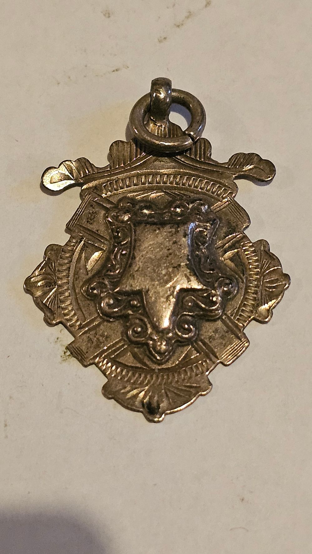 Lot 258: An Edwardian Sterling Silver Blank Pocket Watch Fob, Barker Brothers, Birmingham 1905