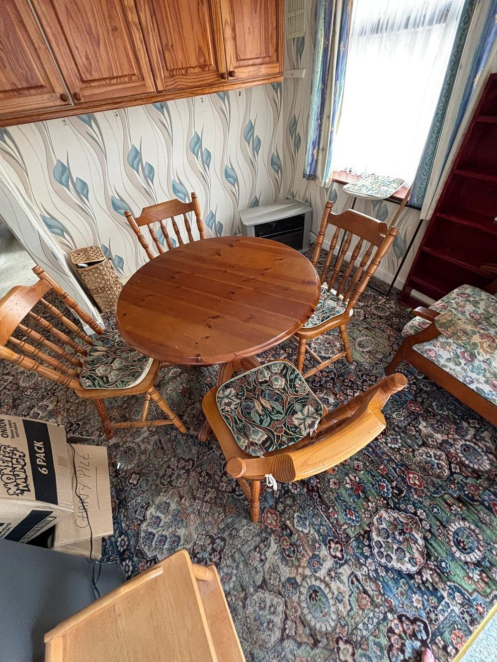 Lot 278: A Set of Pine Dining Furniture comprising a Circular Pedestal Table and Spindle-back Chairs