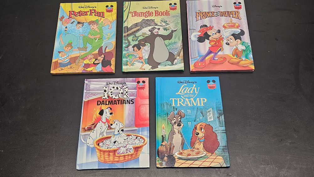Lot 337: Walt Disney Productions. A Collection of Volumes from the Disney's Wonderful World of Reading Series. Grolier, c. 1970s-1990s.