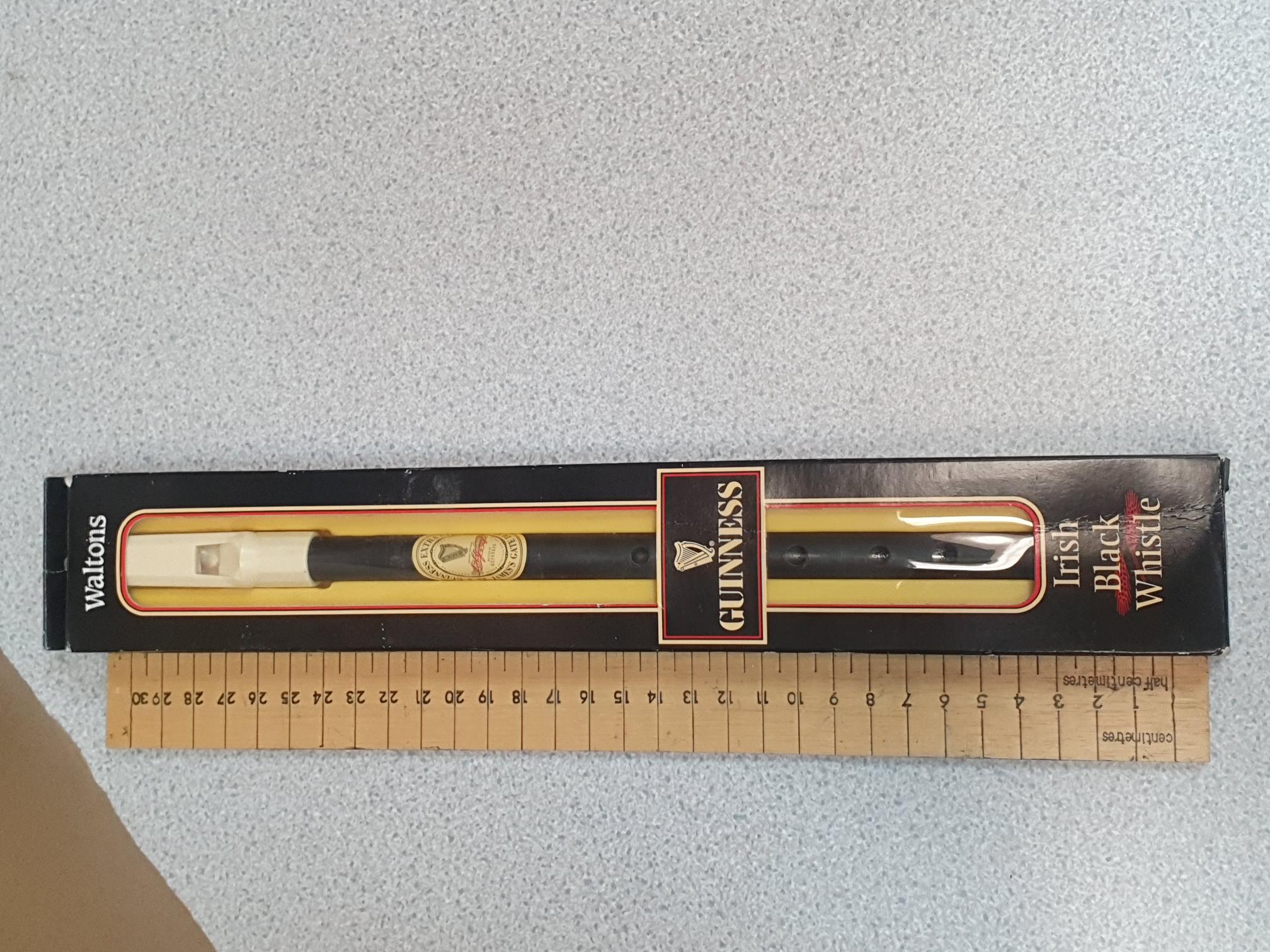 A Waltons Official Guinness Irish Black Whistle in Original Box