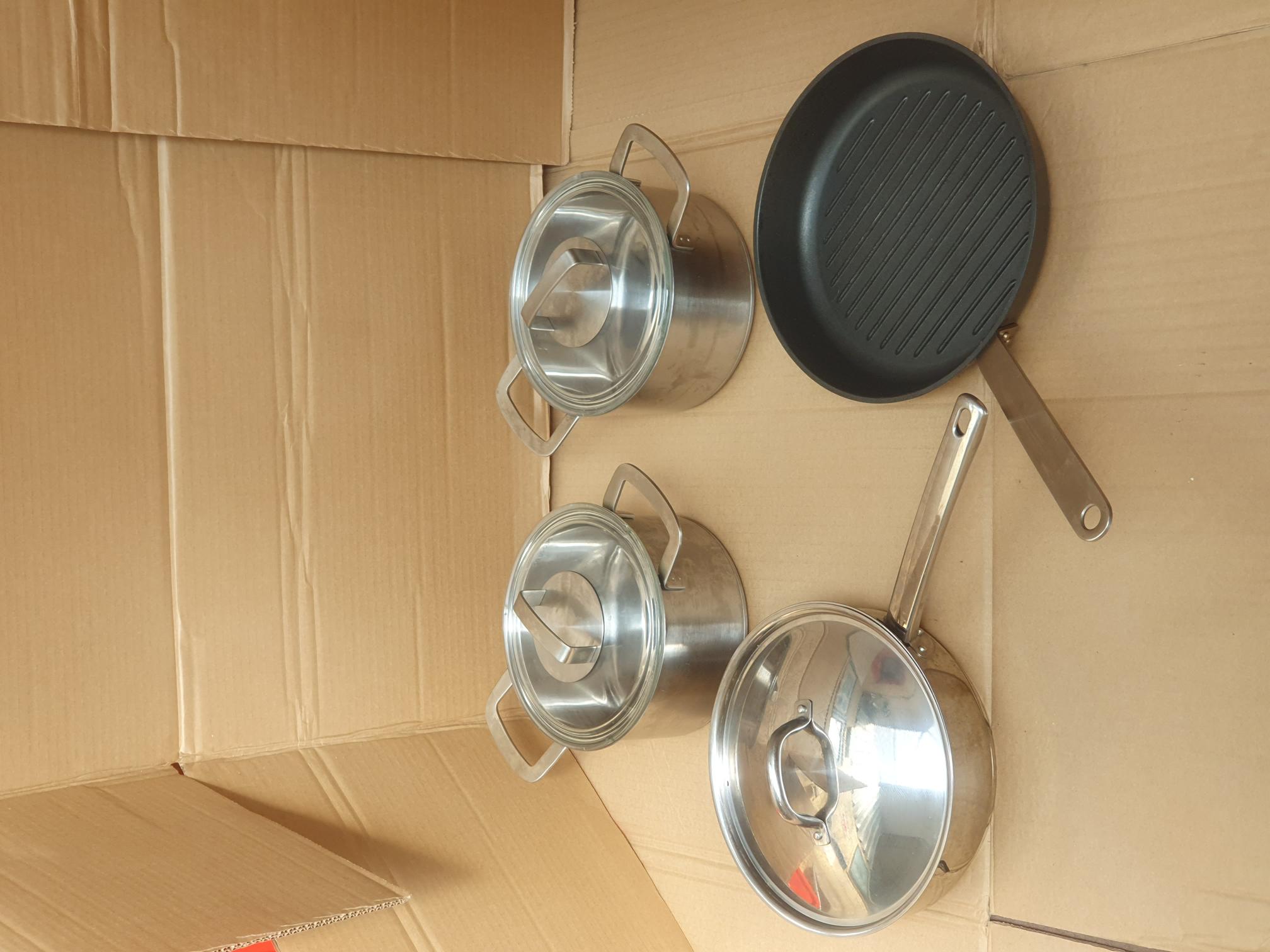 A Four-piece IKEA Stainless Steel Cookware Set