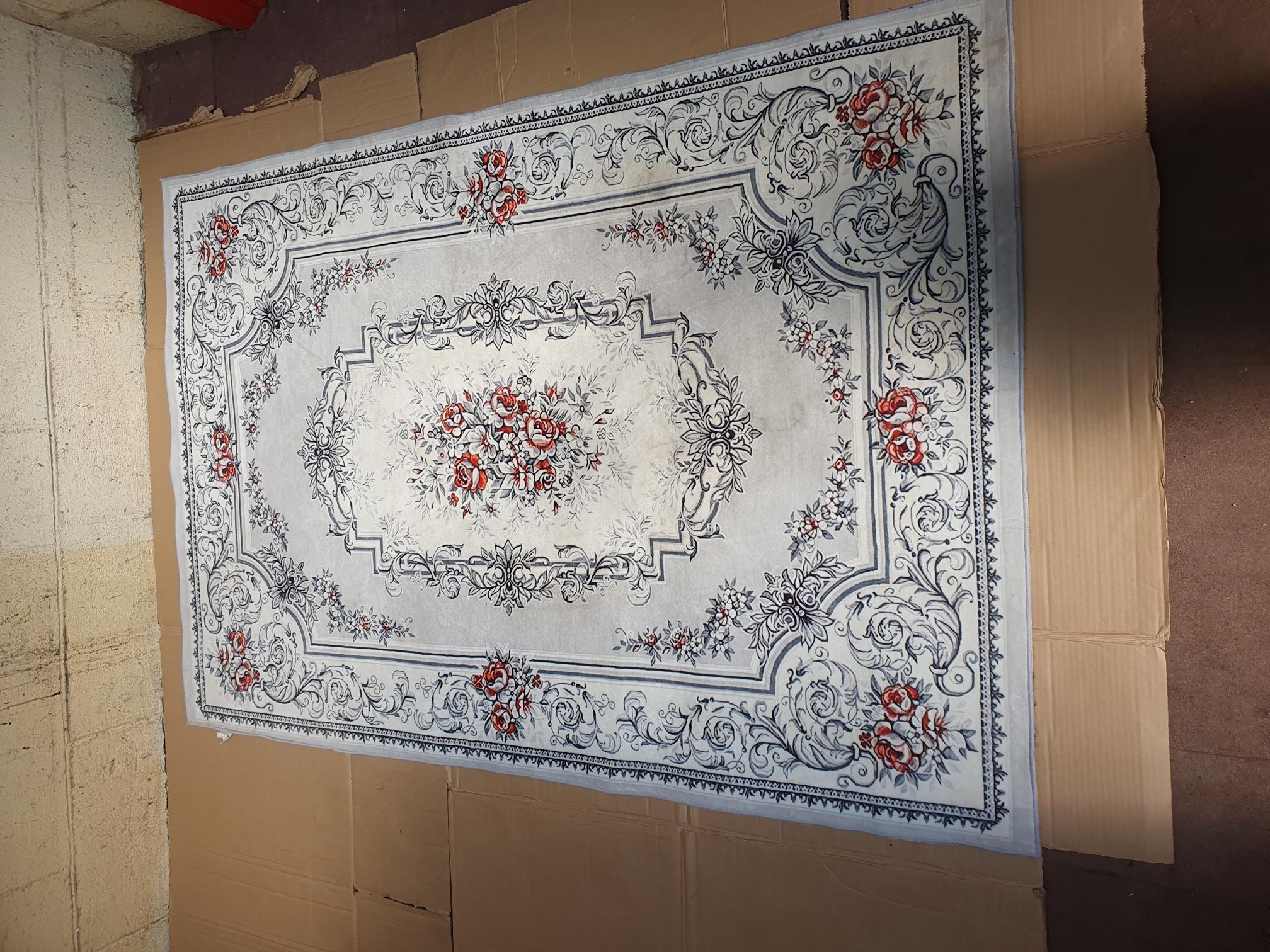 A Dunelm Neoclassical Floral Design Plush Faux Fur Rug