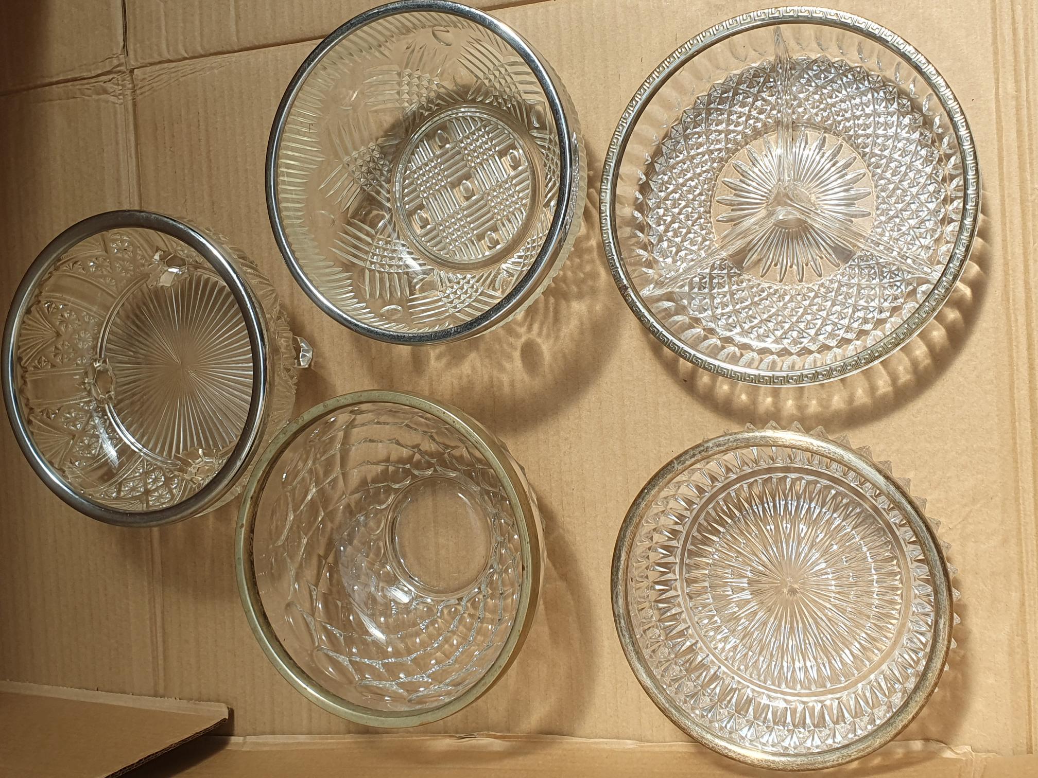 A set of five vintage pressed glass serving bowls and dishes with silver-plated rims