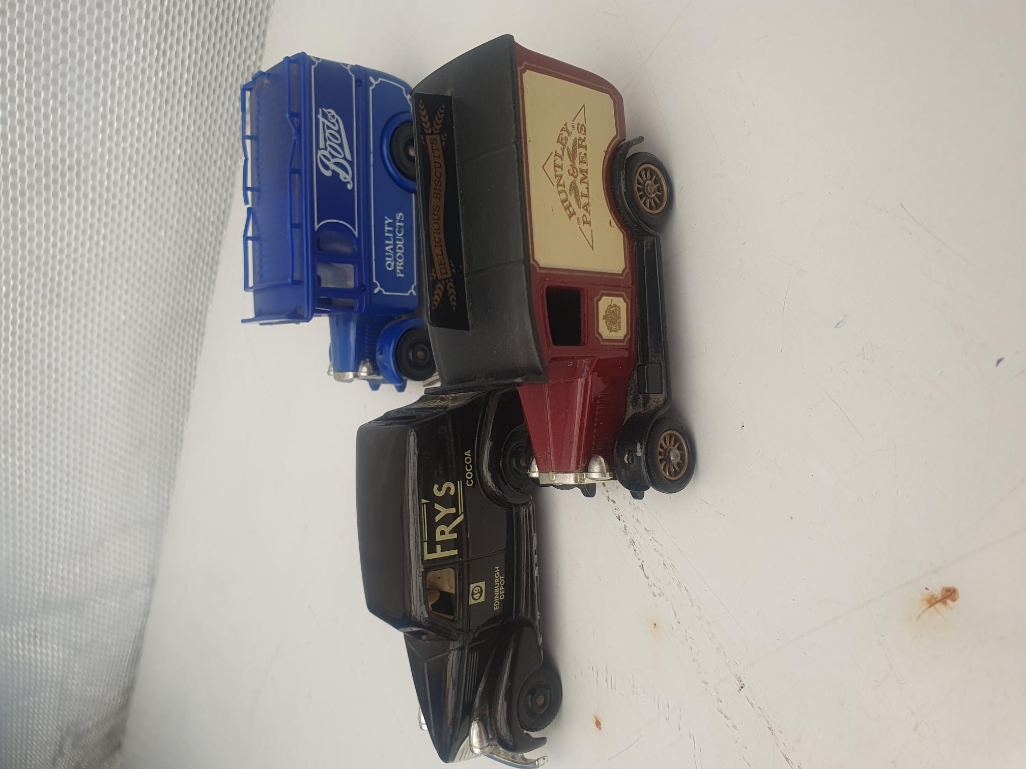 Three Lledo Promotional Delivery Vans