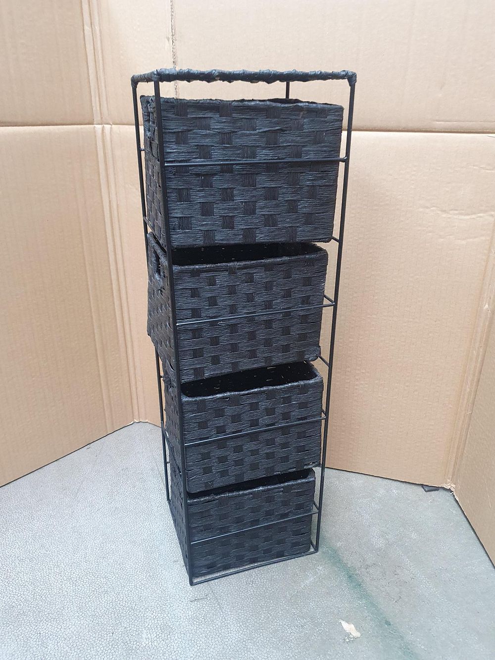 Lot 398: A Contemporary Black Metal and Woven Storage Tower