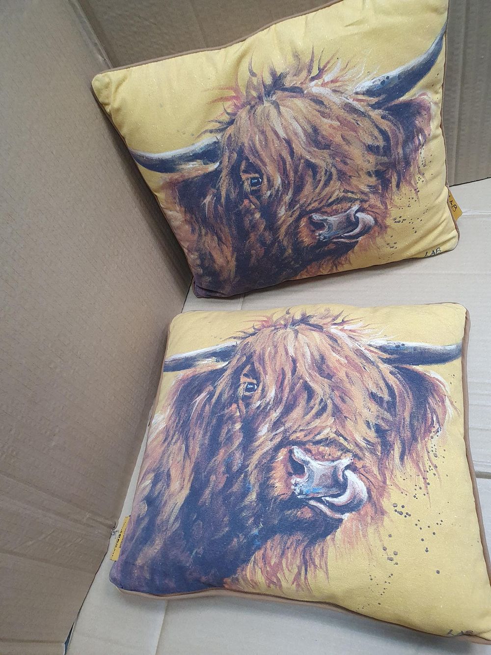 Lot 343: A Pair of Louise Brown Highland Cow Pattern Cushions