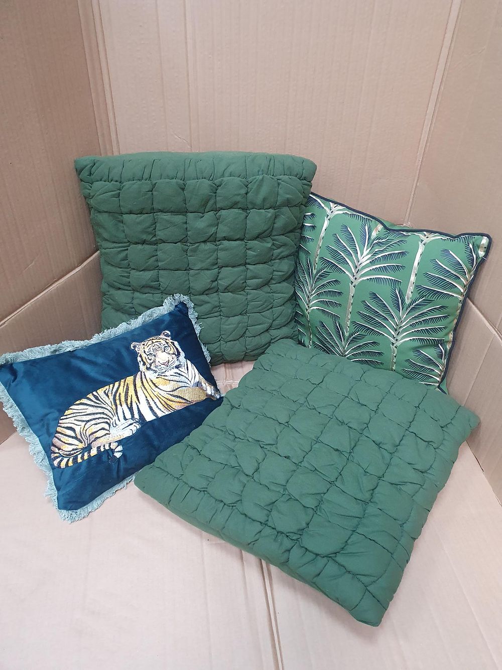 Lot 388: A Collection of Contemporary Decorative Cushions in Green and Teal Tones