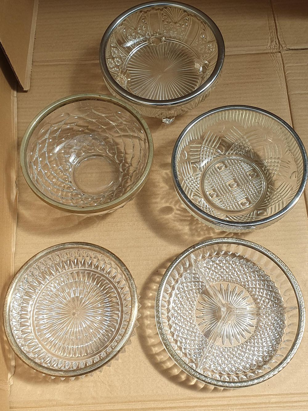 Lot 366: A set of five vintage pressed glass serving bowls and dishes with silver-plated rims