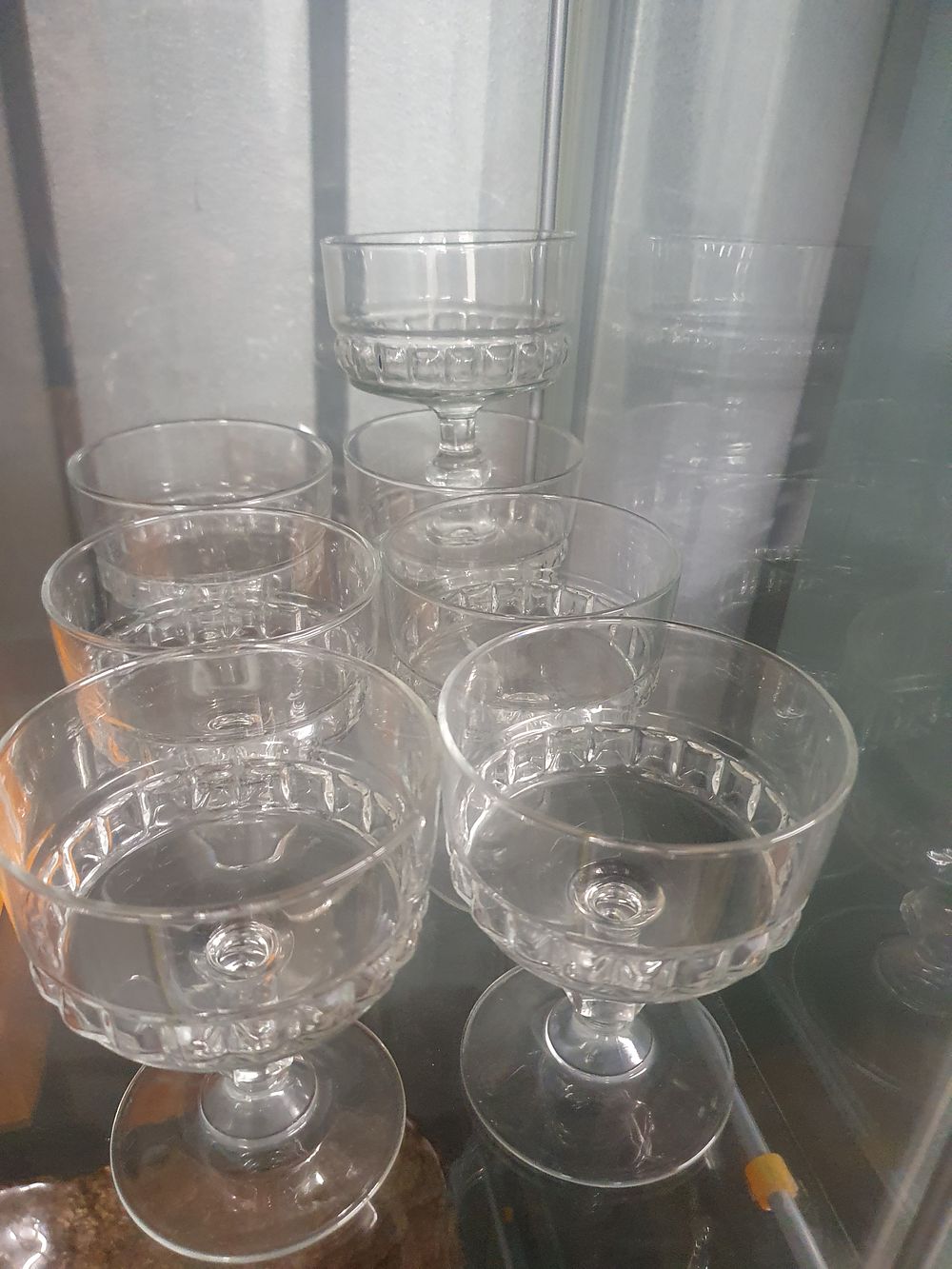 Lot 286: A Set of Arcoroc Clear Pressed Glass Dessert Dishes