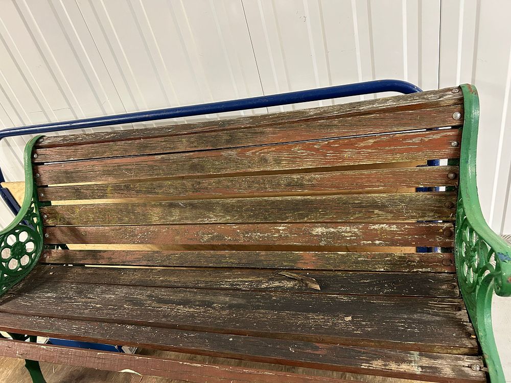 Lot 210: A Victorian Style Cast Iron and Wood Garden Bench