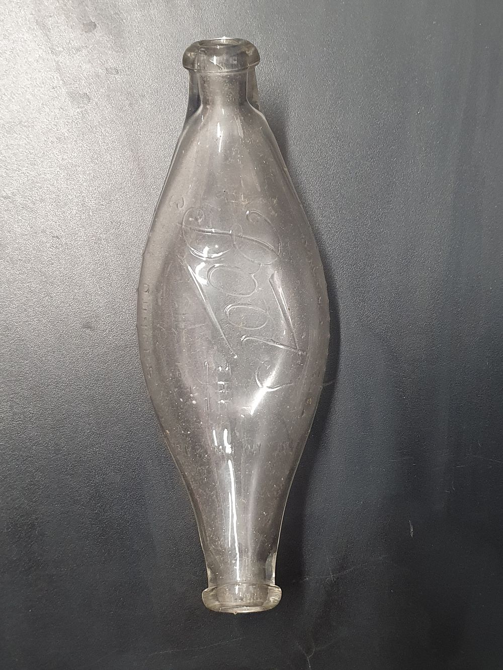 Lot 303: Antique Boots The Chemists Boat-Shaped Glass Baby Feeding Bottle