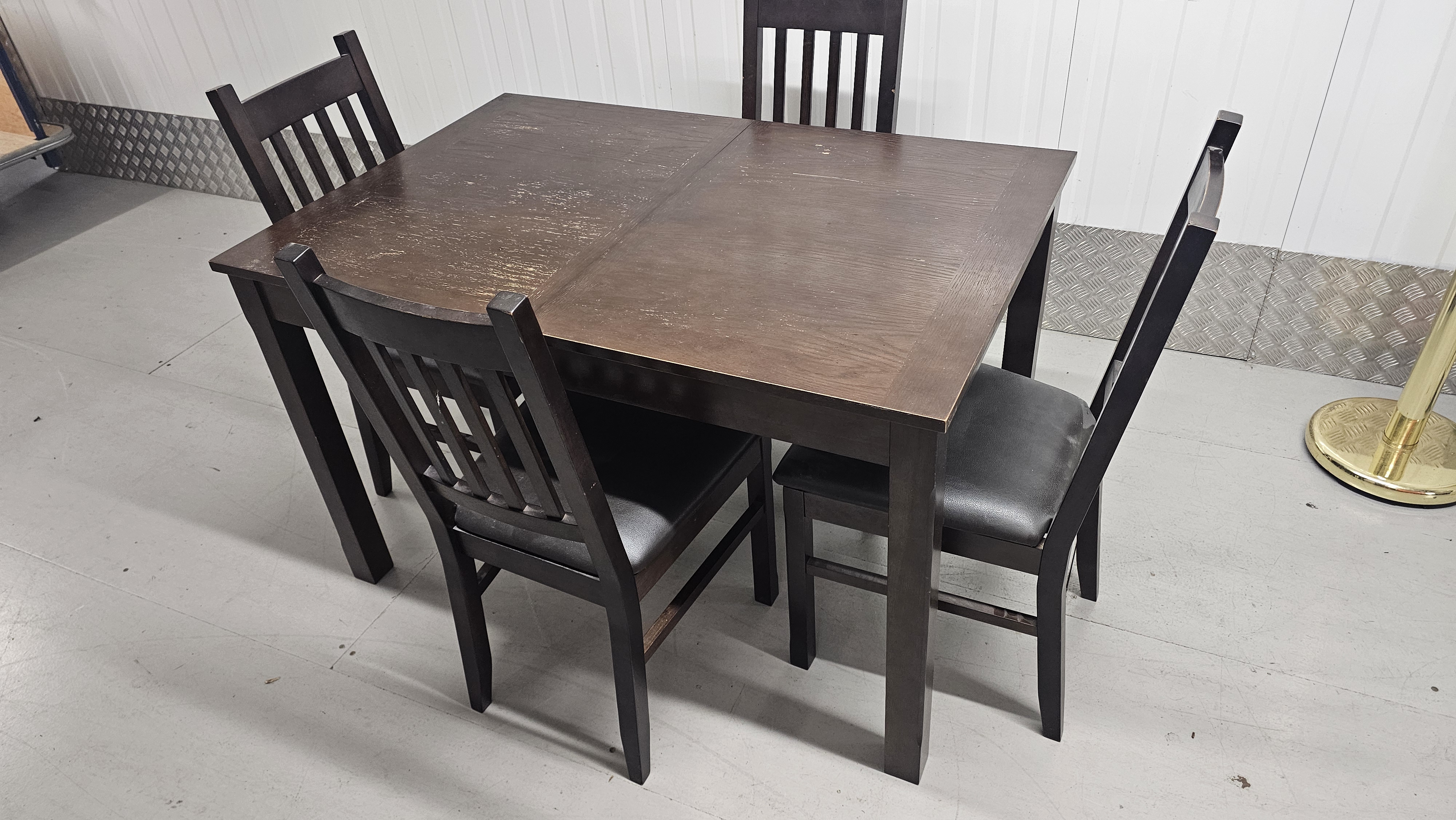 A Set of Contemporary Dark-Stained Hardwood Dining Furniture