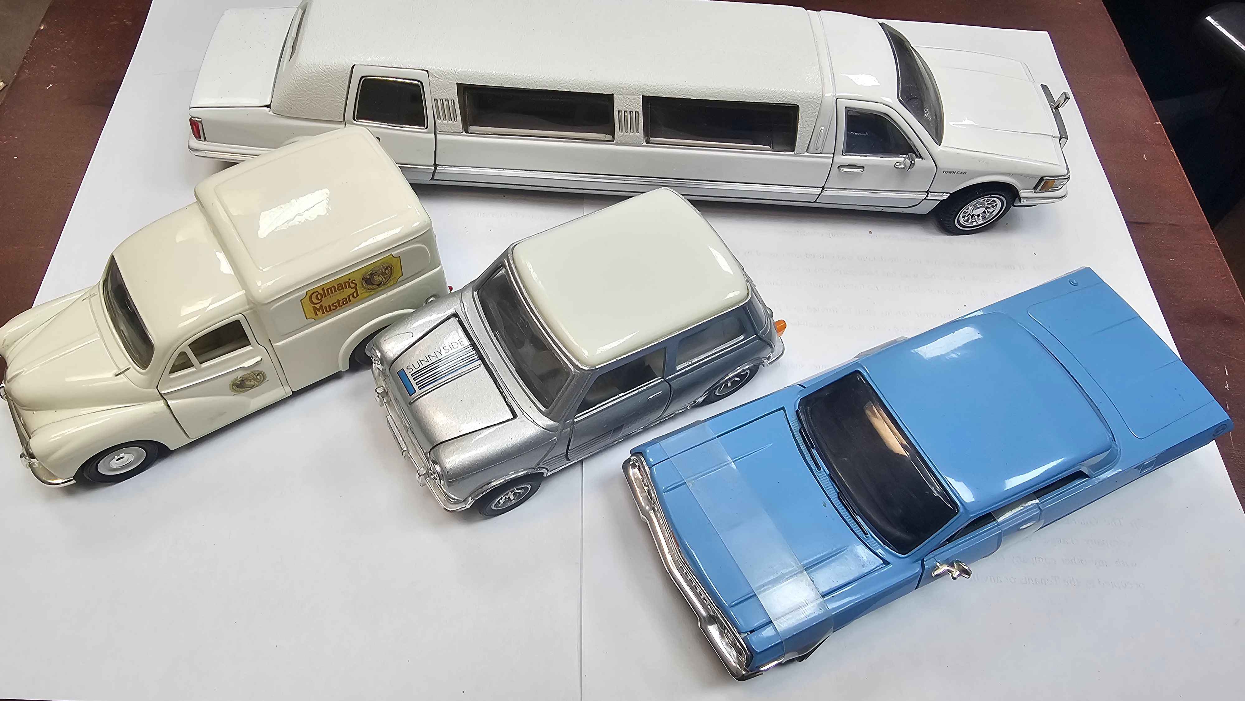 A Group of Die-cast Toy Vehicles including a Sunnyside Superior Lincoln Town Car Limousine