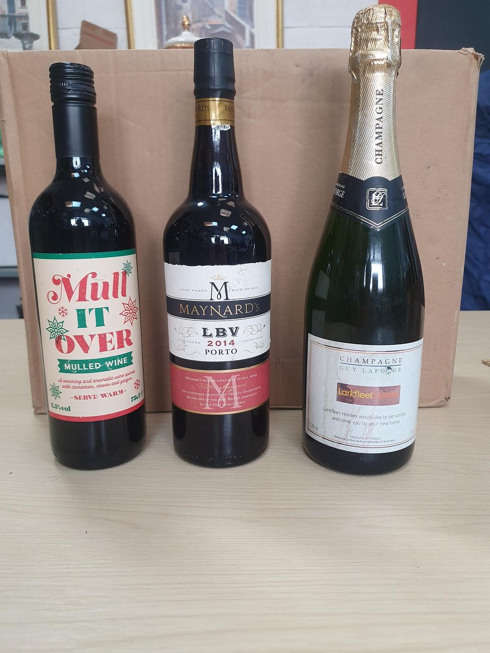 Lot 244: A Trio of Guy Laforge Champagne Maynard's 2014 LBV Port and Mulled Wine - All bottles are New and Sealed
