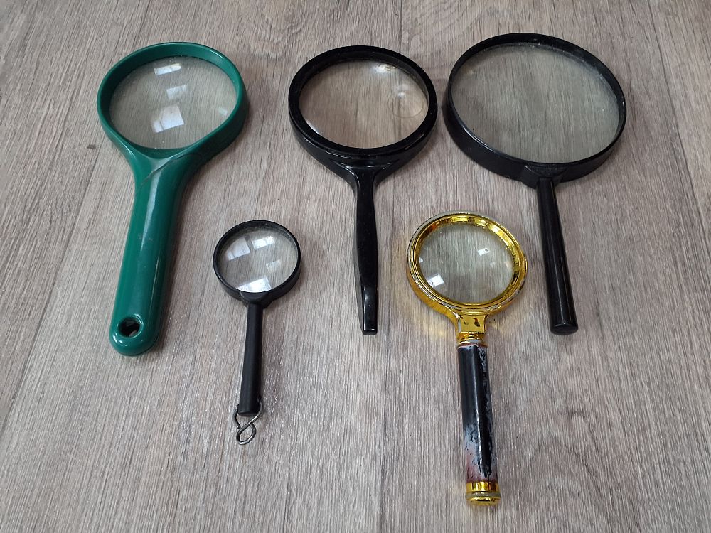 Lot 184: Assorted Plastic and Metal Handheld Magnifying Glasses - Used Condition