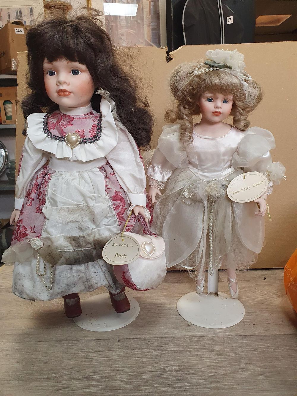 Lot 218: Two Porcelain Bisque Naming Tag Collector Dolls