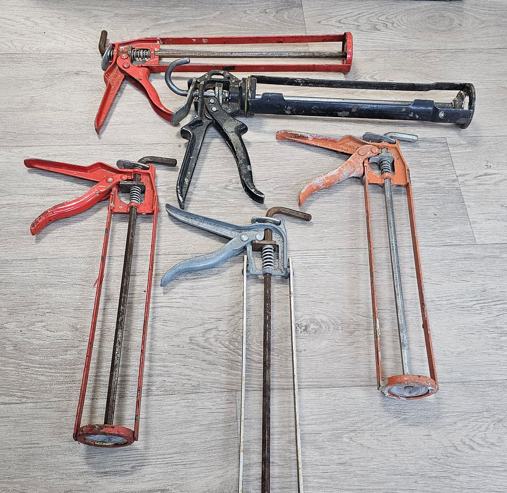 Lot 249: An Assortment of Five Heavy Duty Steel Manual Caulking Guns - Used Condition
