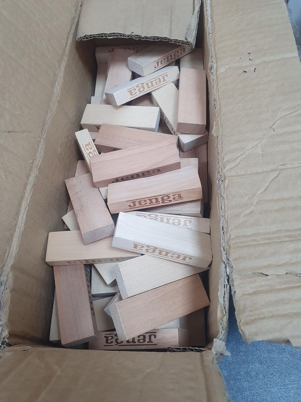 Lot 307: A Collection of Jenga Natural Wood Balancing Blocks - Used Condition