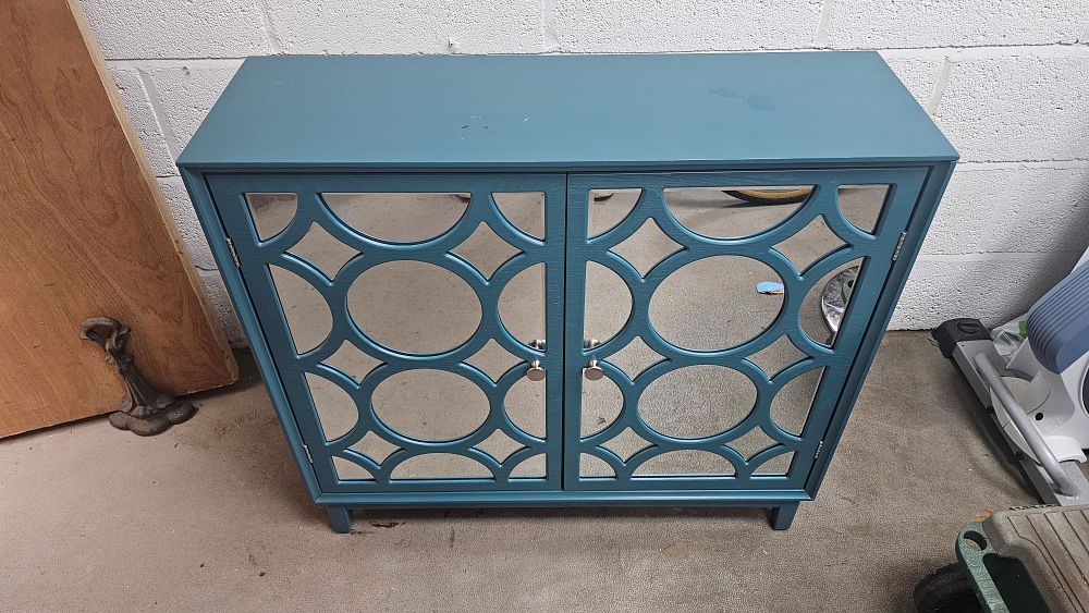 Lot 227: Dunelm Delphi Peacock Small Slim Mirrored Cabinet - Good Condition