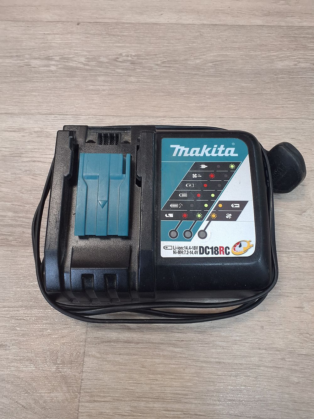 Lot 242: Makita DC18RC Black and Teal Rapid Battery Charger - Tested