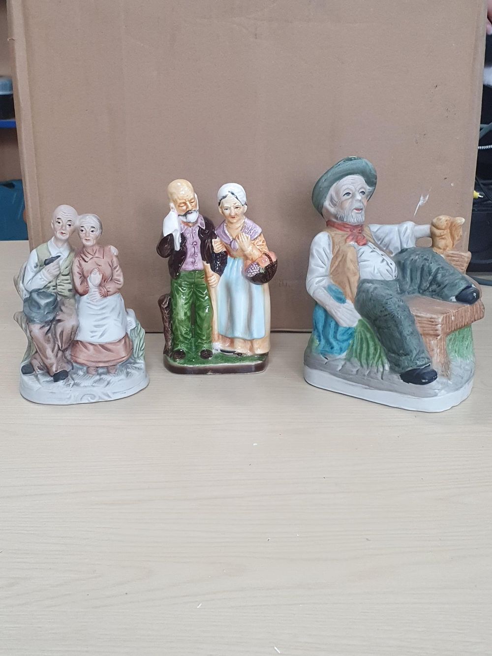 Lot 224: Three Fairylite and Unmarked Glazed and Bisque Ceramic Elderly Figurines - Very Good Condition