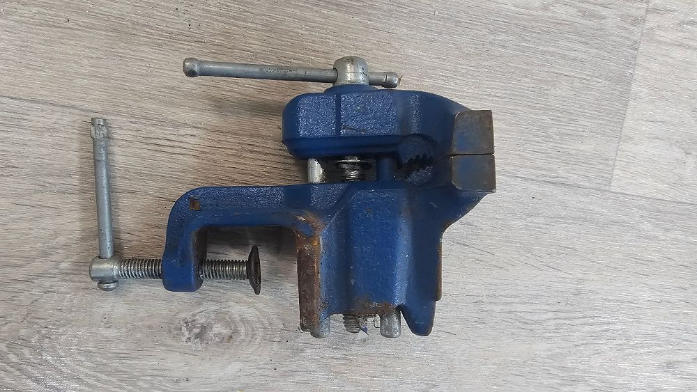 Lot 233: Blue Cast Iron Clamp-On Swivel-Jaw Bench Vice