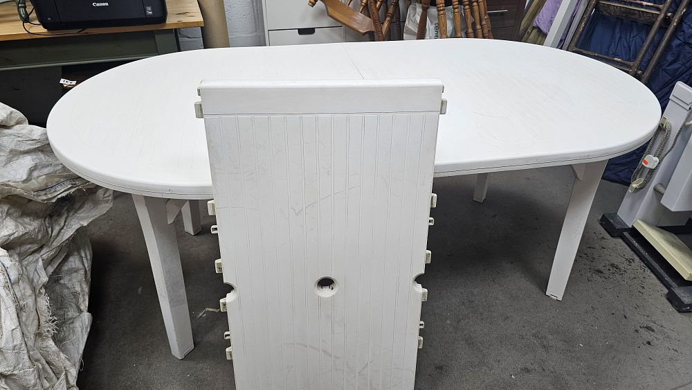 Lot 204: Grosfillex White Moulded Resin Extending Oval Patio Table - Used Condition