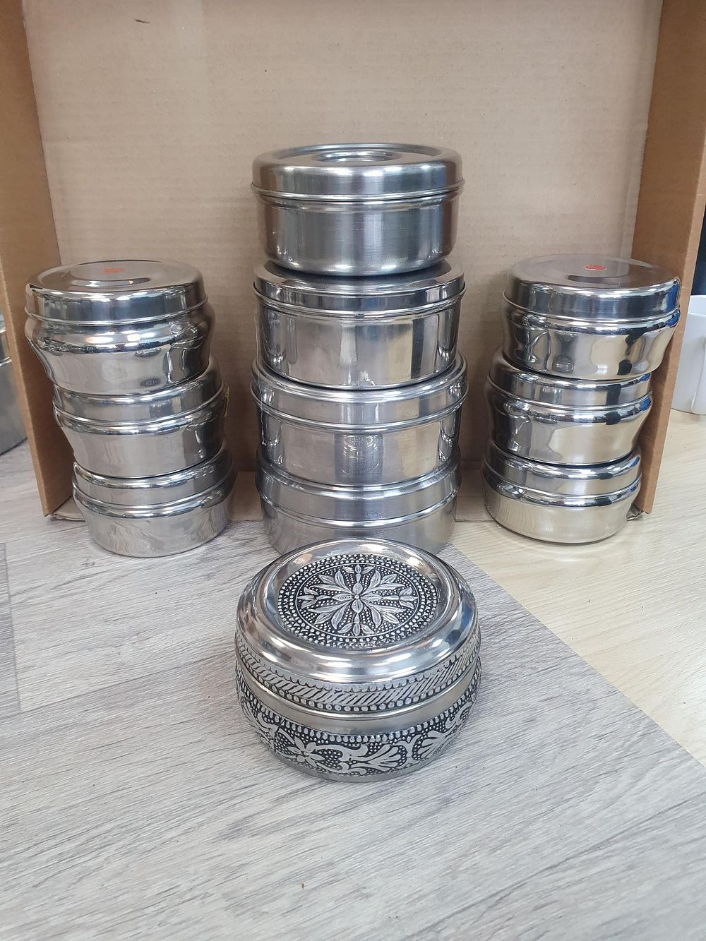 Lot 126: Eleven Piece Polished Stainless Steel Nesting Storage Canister Set