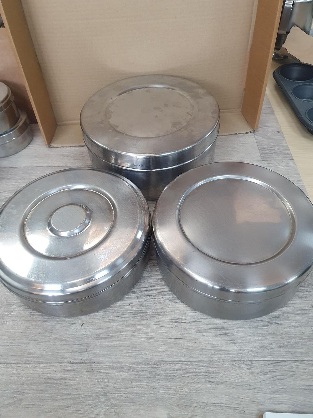 Lot 129: Three Piece Graduated Stainless Steel Cylindrical Food Storage Canister Set