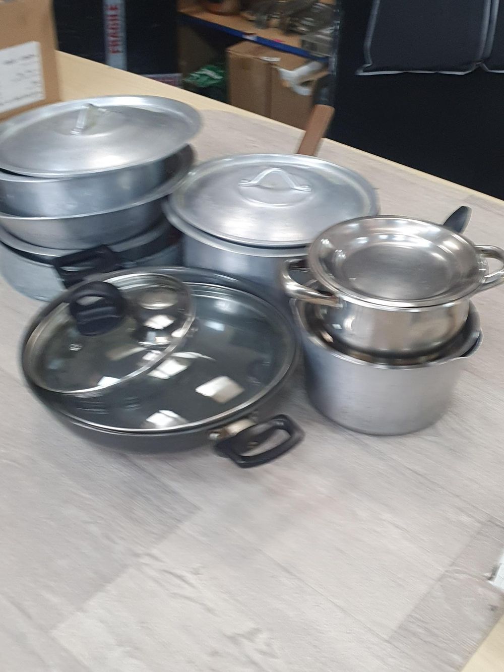 Lot 142: Assorted Aluminum and Stainless Steel Cookware and Lids
