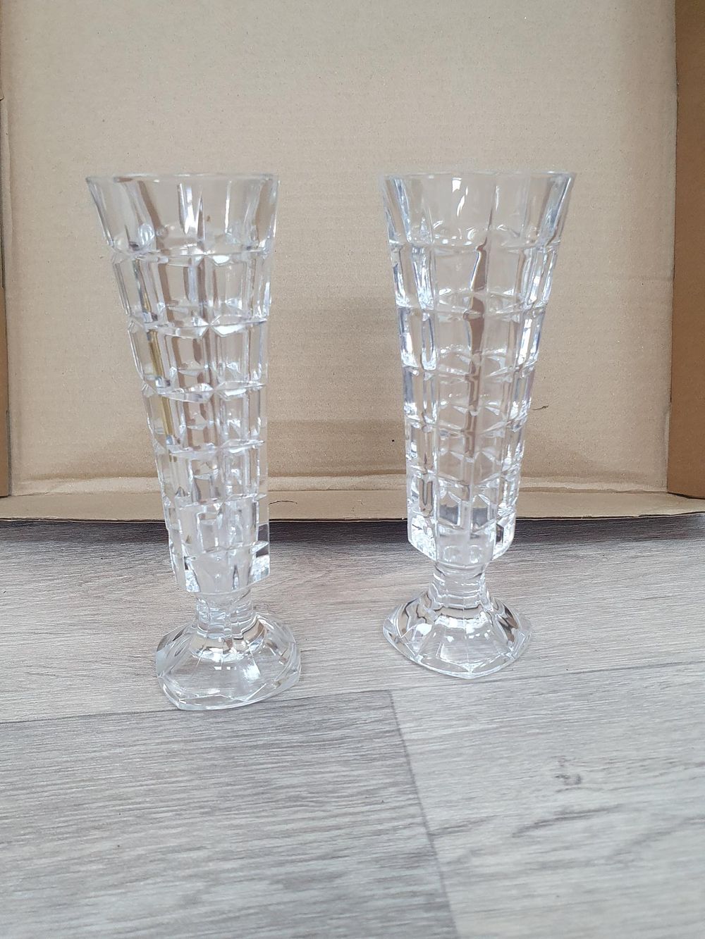 Lot 152: A Pair of Art Deco Cristal D'Arques-Durand Geometric Block Cut Lead Crystal Bud Vases