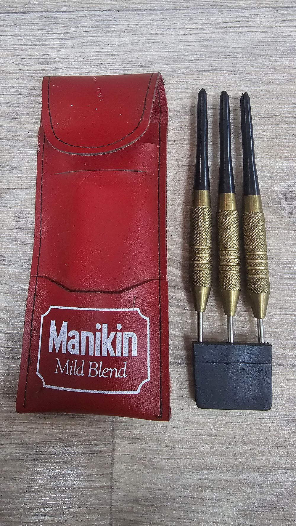 Lot 339: Manikin Mild Blend Knurled Brass Soft-tip Darts and Case