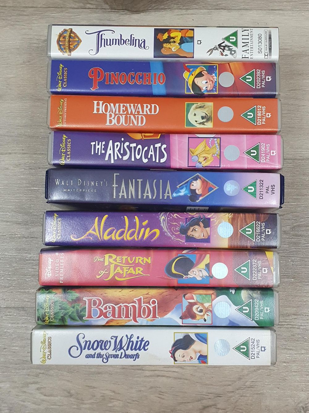 Lot 206: An Assortment of 9 Walt Disney and Warner Bros VHS Tapes - All Excellent Condition