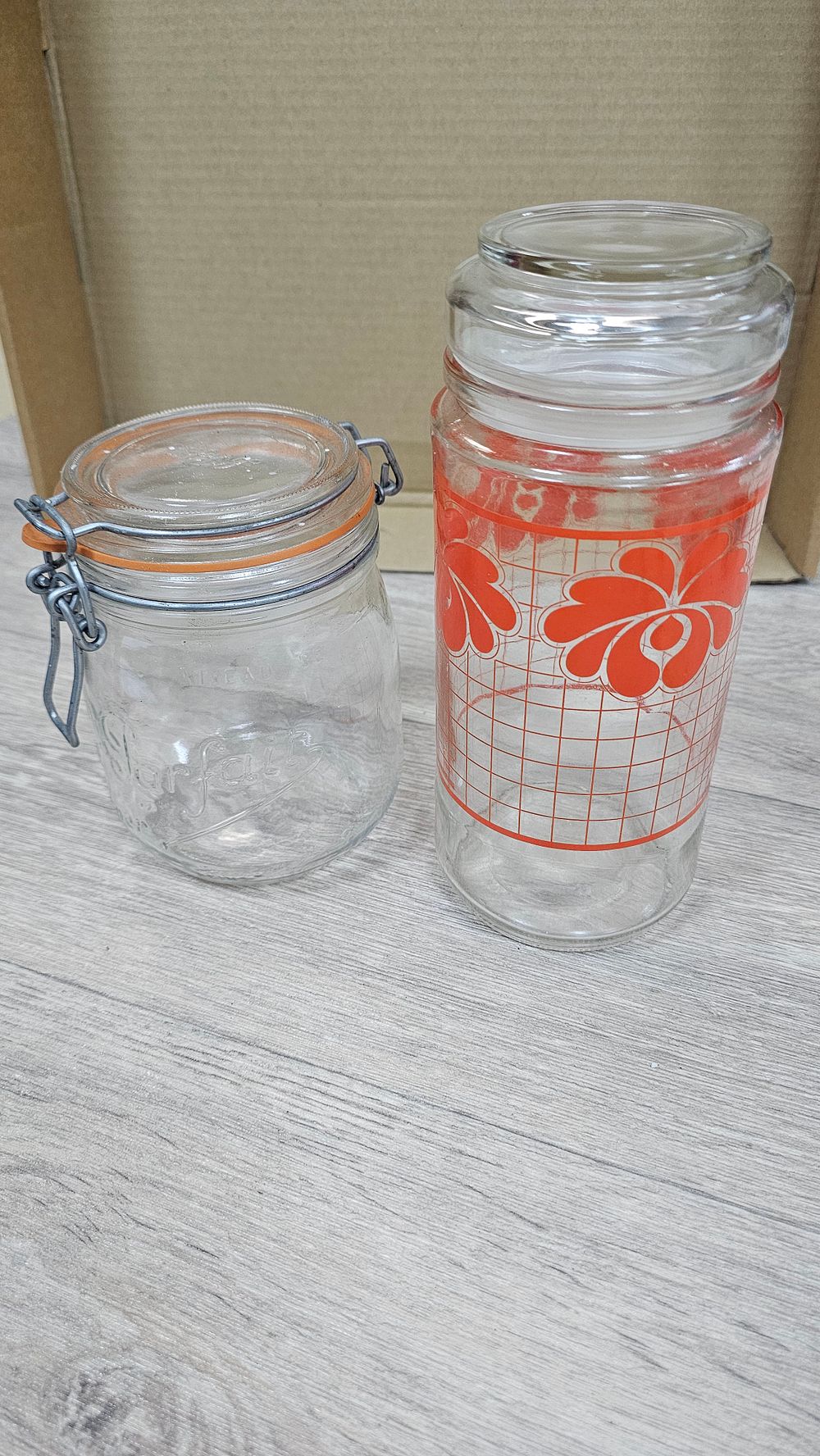 Lot 327: Two Vintage Glass Storage Jars with Orange Floral Pattern - Good Condition