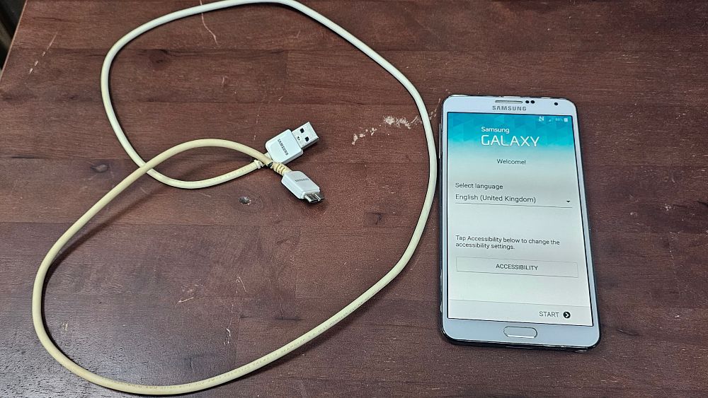 Lot 169: Samsung Galaxy Note 3 White Smartphone with Micro-USB 3.0 Cable