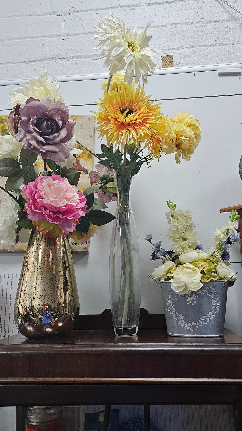 Lot 191: Three Assorted Artificial Floral Arrangements in Glass and Metal Vases