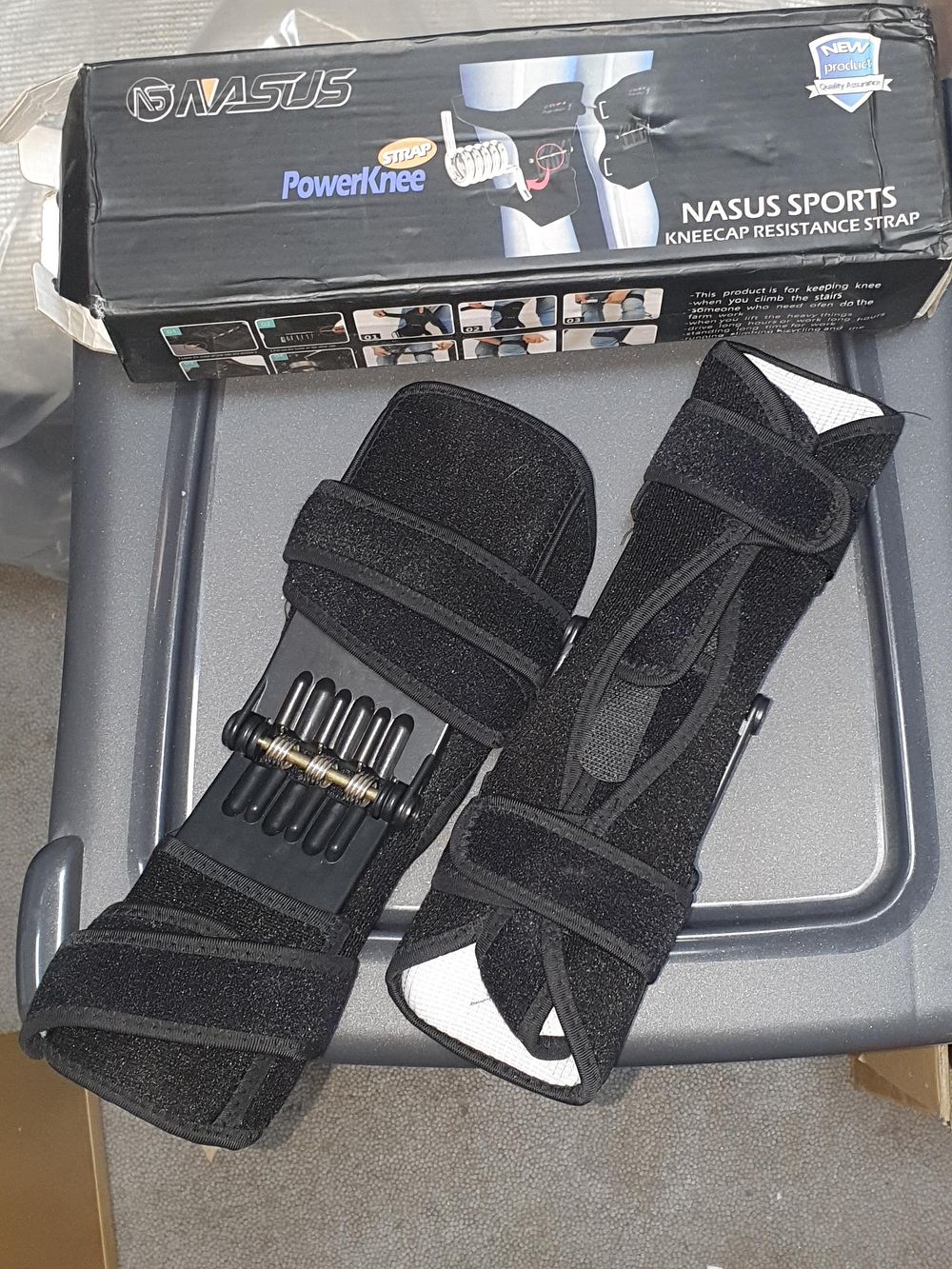 Lot 179: Nasus Sports PowerKnee MY-013 Neoprene Spring Resistance Knee Braces - As New