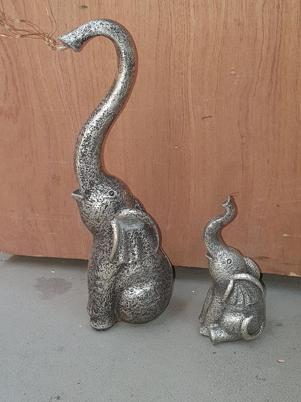 Lot 192: A Pair of Silver Toned Textured Resin Elephant Garden Ornaments